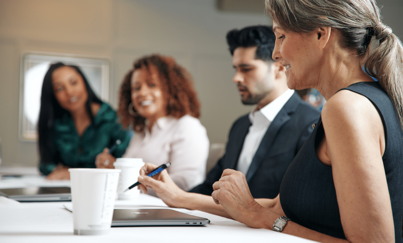 People in a meeting at a corporate event hotel at ICONA